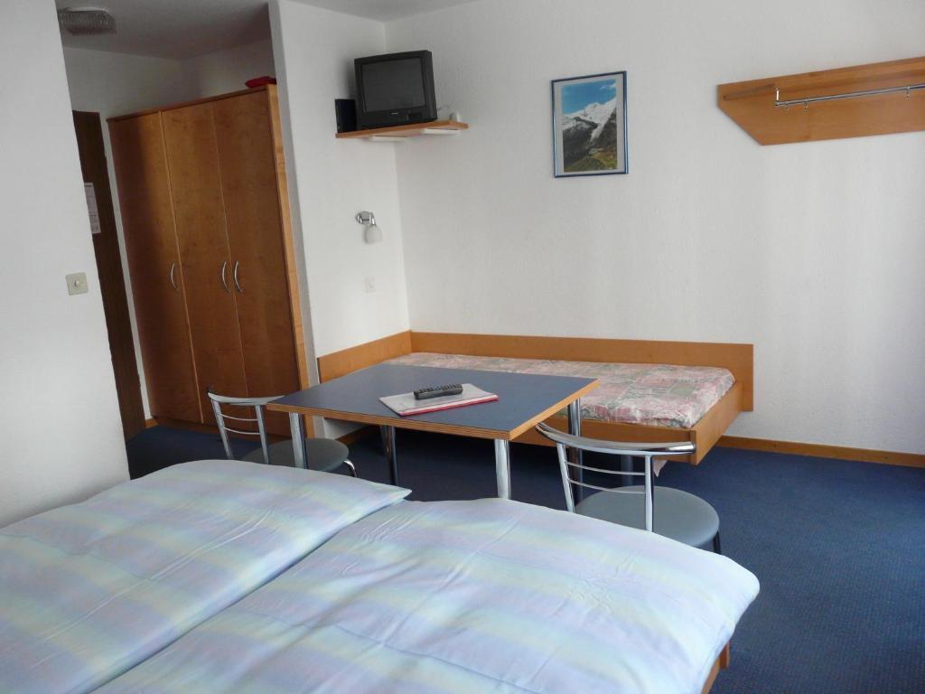 Hotel Garni Domino Saas Fee Værelse billede